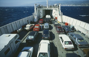 ITALY, Sicily, Messina, Car ferry from Reggio di Calabria approaching Sicily across the Straits of