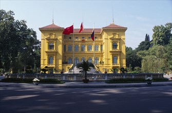 VIETNAM, North, Hanoi, The Presidential Palace yellow painted exterior facade.