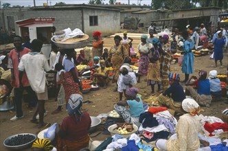 GHANA, Accra, Crowded market place in village near Accra with mixed produce for sale.