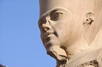 EGYPT, Nile Valley, Karnak, Precinct of Amun.  Head detail of statue of Pharaoh.