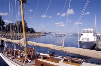 USA, Massachusetts, Plymouth, View over moored boats in the harbour with the Mayflower 2 in the
