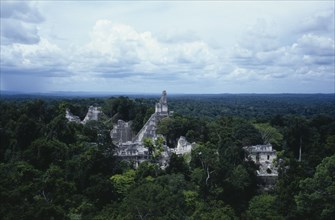 GUATEMALA, Tikal, Aerial view over the ruins and surrounding tree tops
