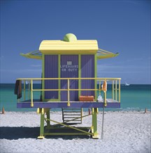 USA, Florida, Miami, Brightly coloured Art Deco style Life Guards hut on Miami Beach