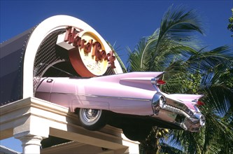 USA, Florida, Miami, Hard Rock Cafe sign with pink cadillac feature