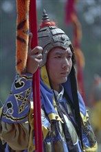 CHINA, Shandong, Jinan, Portrait of a guard in costume at a reenactment
