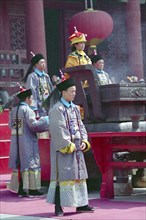 CHINA, Shandong, Jinan, People dressed as Guards and an Emporer at a reenactment