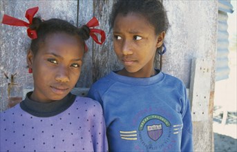 DOMINICAN REPUBLIC, Children, Girls, Two twelve year old friends.