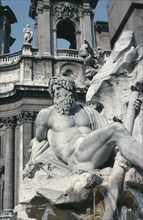 ITALY, Lazio, Rome, Piazza Navona.  Fontana dei Fiumi.  Detail of fountain depicting figures