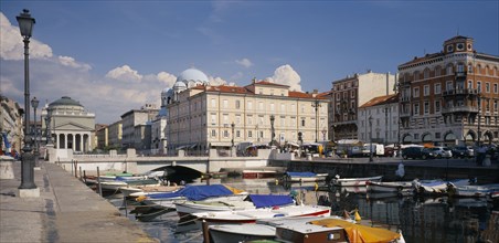 ITALY, Friuli-Venezia Giulia, Trieste, Grand Canale and iew over moored boats toward the waterfront