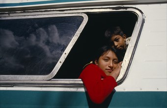 MEXICO, People, Children, Guatemalan refugee children looking out of bus window.