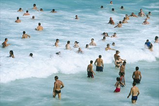 AUSTRALIA, New South Wales, Sydney, Bathers in the sea at Tamarama beach