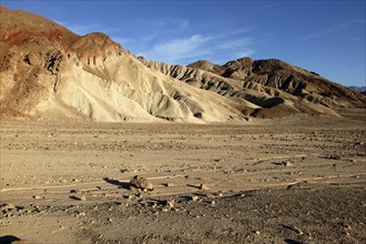 USA, California, Death Valley, View toward layered sculpted rock hills