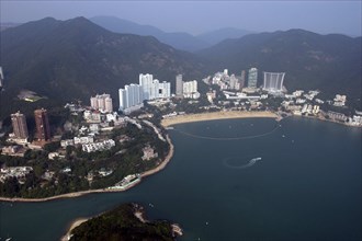 HONG KONG, General, Aerial view looking down on the beach and coastline lined with hotels