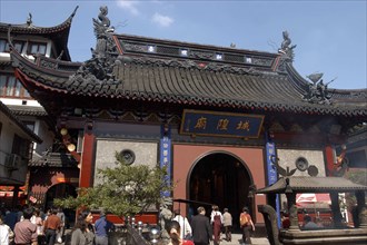 CHINA, Shanghai, Yuyuan Gardens. Busy area with traditional style architecture