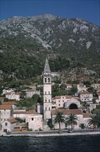SERBIA , and MONTENEGRO, Kotor, Church belltower viewed across water