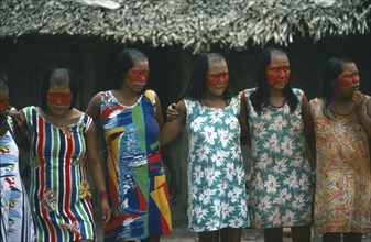 BRAZIL, Amazonas, Xingu Park, Xikrin Indian women with the tops of their heads shaved and their