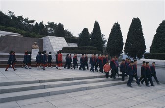 NORTH KOREA, Pyongyang, Group of children visiting the Tomb of the Martyrs outside the city.