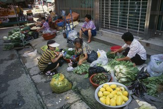 SOUTH KOREA, Kangwon, Sokcho, Women street vendors selling fruit and vegetables and kimchi in east