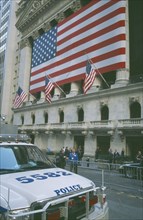 USA, New York, Manhattan, The Stock Exchange on Wall Street with columns draped with Stars and