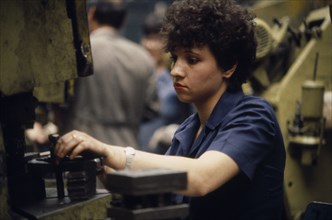 ROMANIA, Bucharest, Female factory worker.