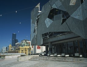 AUSTRALIA, Victoria, Melbourne, Federation Square modern facades with the Flinders Street railway