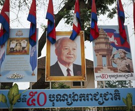 CAMBODIA, Poipet, Billboard image of King Sihanook