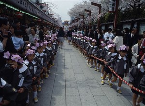 JAPAN, Asakusa, Tokyo, Nursery school children dressed for the flower festival on Buddhas birthday
