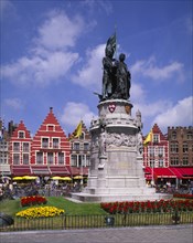 BELGIUM, West Flanders, Bruges, Statue of Jan Breydel and Pieter de Coninck in the market place.