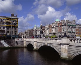 IRELAND, Dublin, O'Connell Street and Bridge with people walking across