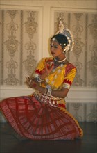 INDIA, Orissa, Clasical Indian dancer performing Odissi Temple style dance.