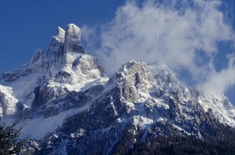 ITALY, Trentino Alto Adige, Dolomites, Snow covered peaks near San Martino del Castrozza.