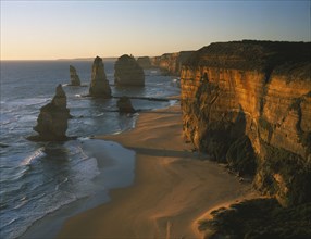 AUSTRALIA, Victoria, Port Campbell N.P, Great Ocean Road. View along the beach and cliffs toward
