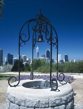 AUSTRALIA, Western Australia, Perth, Kings Park well with ornamental ironwork and bell with the