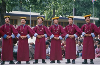 INDIA, Himachal Pradesh, Festivals, Tibetans in traditional costume celebrating the birthday of the