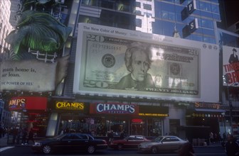 USA, New York, Manhattan, Advertising showing new US Dollar note with added colour for increased