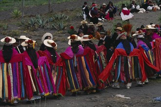 ECUADOR, Tungurahua, Salasaca, Corpus Christi dancers in colourful costume during celebrations held