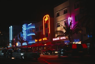 USA, Florida, Miami Beach, Ocean Drive hotel facades illuminated at night