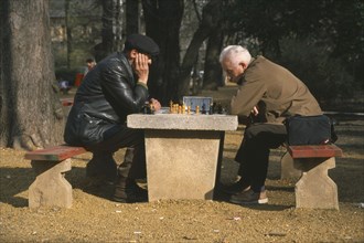 HUNGARY, Budapest, Chess players in park.