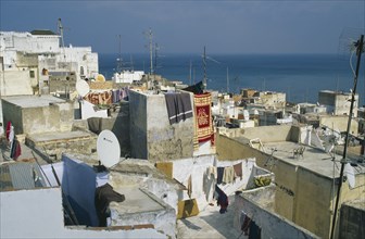 MOROCCO, Tangier, View over rooftops with satelite dishes visible