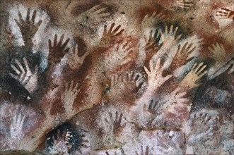ARGENTINA, Patagonia, Cueva de las Manos, "Cave of the Hands.  Prehistoric rock paintings of human