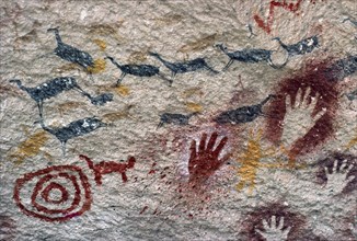 ARGENTINA, Patagonia, Cueva de las Manos, "Cave of the Hands.  Prehistoric rock paintings of human