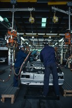 TRINIDAD, Industry, Workers in Neal and Massy Nissan car plant.