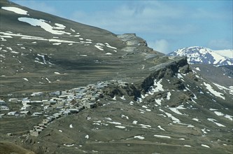 RUSSIA, Dagestan, Caucasus Mountains, Mountain landscape and village.