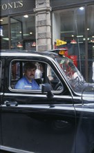 TRANSPORT, Road, Taxi, Detail of London cabbie in his taxi