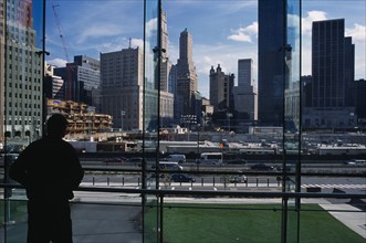 USA, New York, Manhattan, People looking over Ground Zero during reconstruction of the World Trade