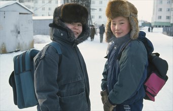 RUSSIA, Siberia, Siberian schoolboys in winter clothing.
