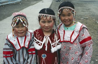 RUSSIA, Siberia, Kamchatka Peninsula, Chukchi girls dressed for Spring Festival Achai Vayam.
