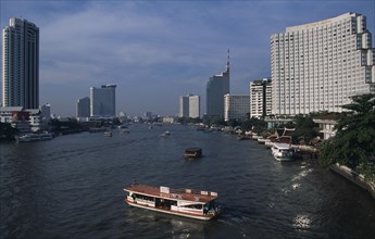 THAILAND, South, Bangkok, The Shangri La Hotel on the right The Peninsula Hotel on the left either