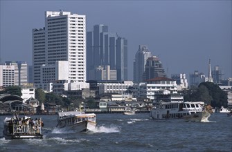 THAILAND, South, Bangkok, Crowded ferries on the Chao Phraya river