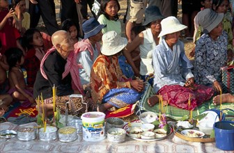 CAMBODIA, Siem Reap, Angkor Wat, Shaman ceremony Khmer people with offerings of food in front of